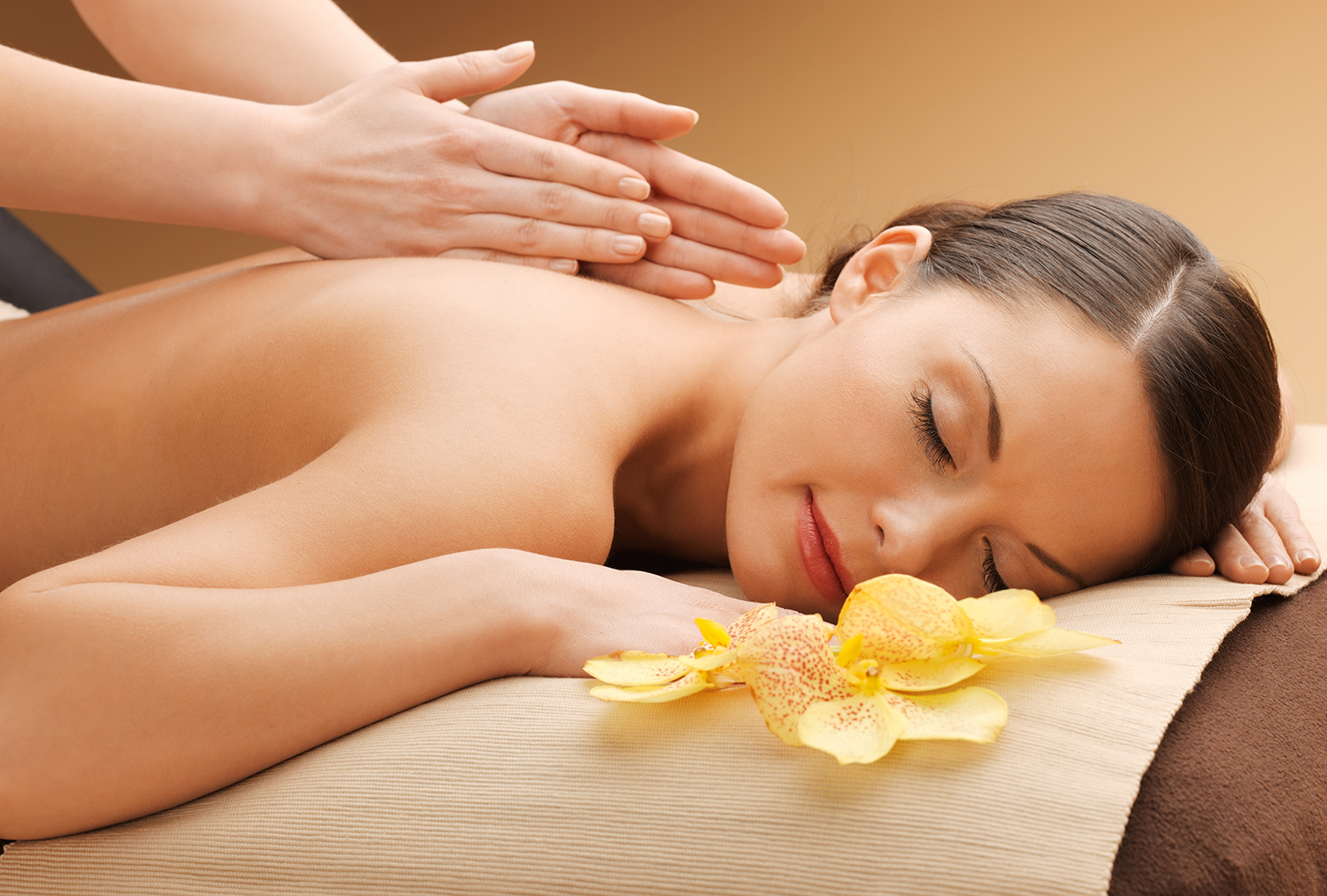 Spa massage with orchid detail